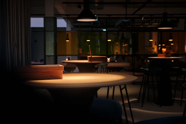 Restaurant interior with tables and pendant lighting